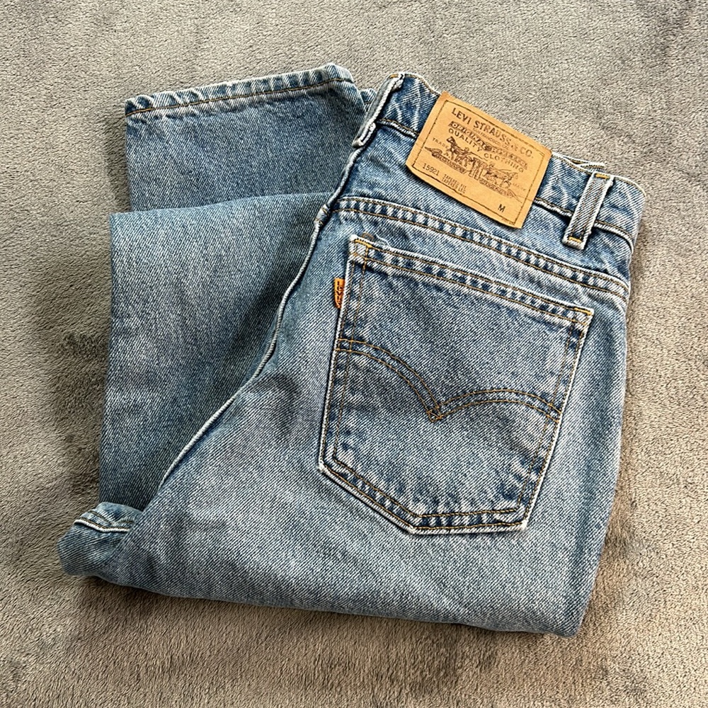 vintage Levi's 15921 tapered leg jeans featuring a classic orange tab